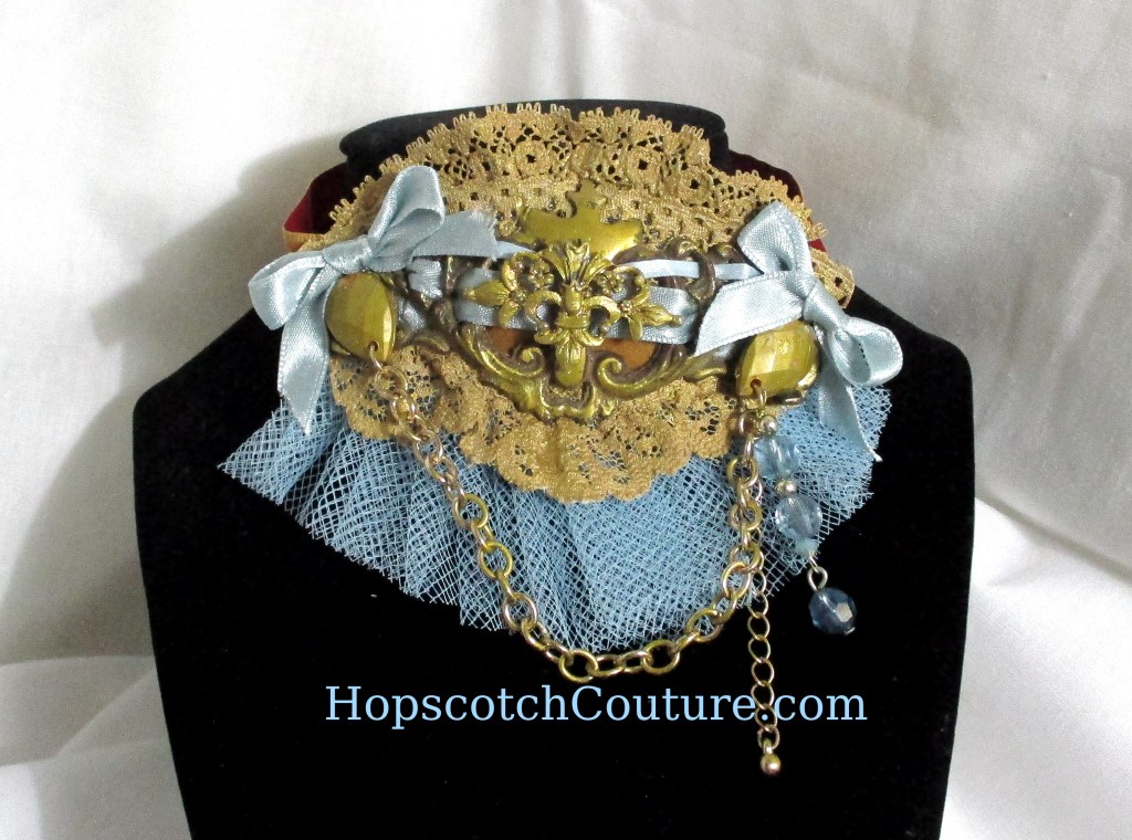 Blue and Gold Victorian Choker Necklace. Made from all vintage materials and antique hardware by Marelle Couture for Hopscotch Couture. https://hopscotchcouture.com/products/blue-n-gold-choker-satin-lace-n-brass-necklace-victorian-upcycled-jewellery-by-marelle-couture?_pos=1&_psq=blue+choker&_ss=e&_v=1.0 #bluechoker #goldchoker #chokernecklace #victorianchoker