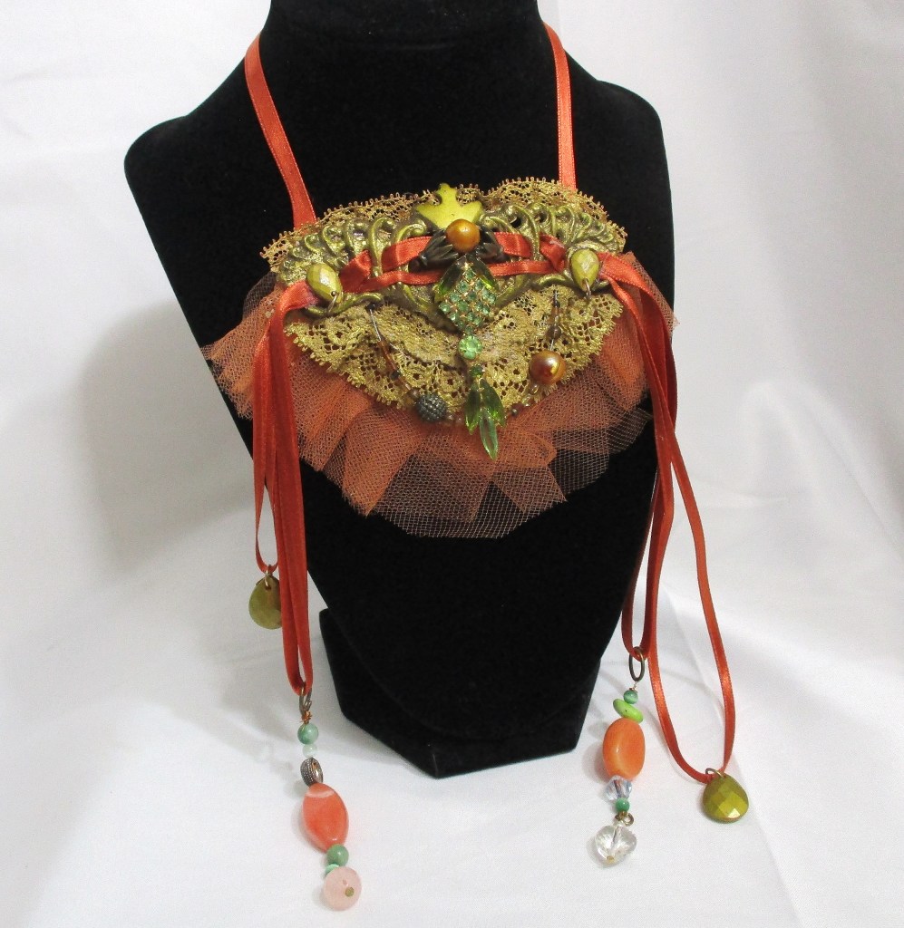 Orange and Gold Victorian Style Bib Necklace, Statement Necklace by Marelle Couture for Hopscotch Couture https://hopscotchcouture.com/products/victorian-satin-choker-antique-upcycle-lace-necklace-antique-brass-necklace-ooak?_pos=2&_psq=orange&_ss=e&_v=1.0 #statementnecklace #orangenecklace #bibnecklace