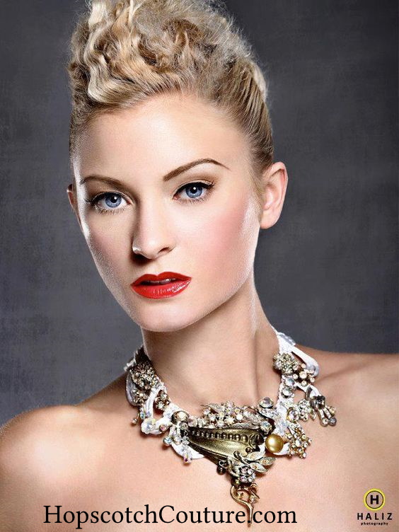 Model wearing a Custom Made Bridal Bib Rhinestone Necklace by Marelle Couture for Hopscotch Couture. https://hopscotchcouture.com/products/custom-wedding-necklace-personalized-statement-pieces-made-to-order-victorian-noir-bridal-necklace?_pos=9&_sid=c20267e64&_ss=r #BridalBibNecklace #StatementBibNeclace #RheinstoneBibnecklace #WeddingBibNecklace