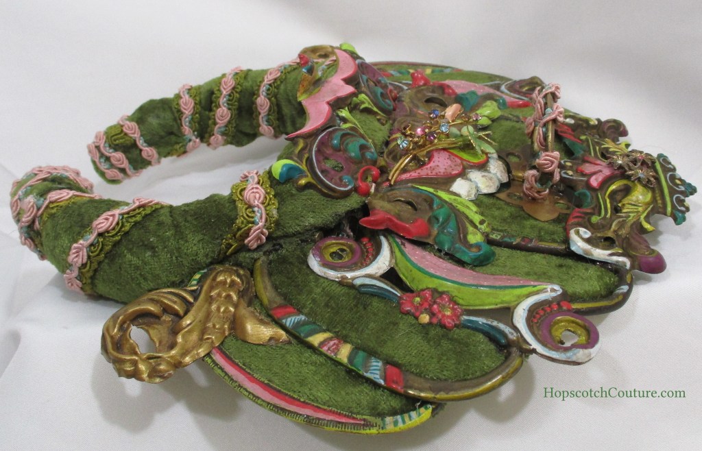 close up left top of green headband crown made by Marelle Couture for Hopscotch Couture. https://hopscotchcouture.com/collections/royal-crowns-and-bridal-headpieces #headbandcrown #greenvelvetcrown #fairytalecrown #bridalcrown