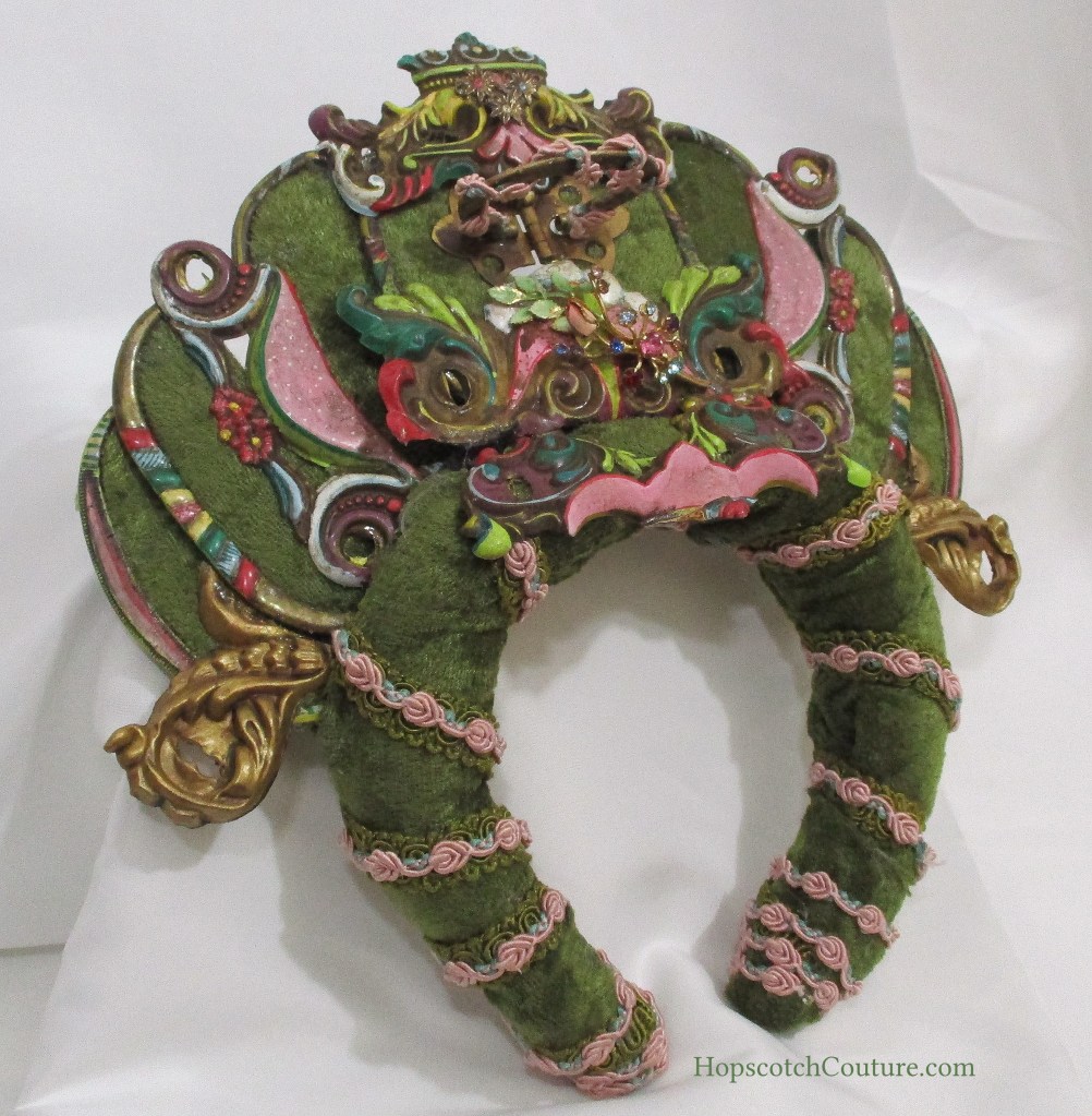 right view of green headband crown made by Marelle Couture for Hopscotch Couture. https://hopscotchcouture.com/collections/royal-crowns-and-bridal-headpieces #headbandcrown #greenvelvetcrown #fairytalecrown #bridalcrown