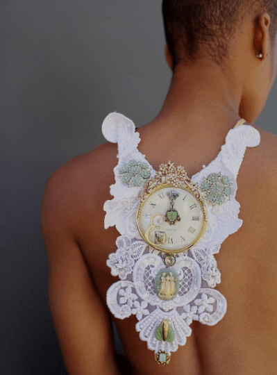 Model Wearing Handmade statement neck piece by Marelle Couture made from vintage jewelry and findings. https://hopscotchcouture.com/ #Statementneckpiece #BibNecklace
#HopscotchCouture
