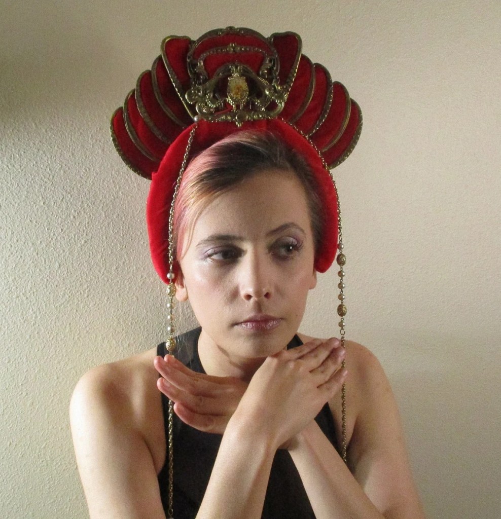 Model wearing red velvet and gold headband crown by Marelle Couture. https://marellecouture.etsy.com #redvelvetcrown #headbandcrown #hardwarecrown #headpiece #MarelleCouture